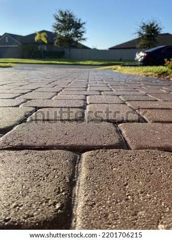 Smooth Sealed Concrete Paver Closeup Royalty-Free Stock Photo #2201706215