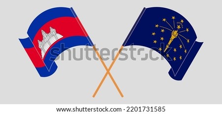 Crossed and waving flags of Cambodia and the State of Indiana. Vector illustration
