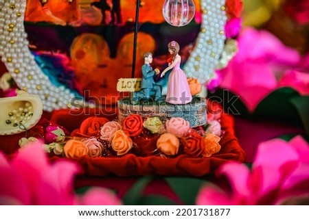 Shape Of Couple of Love. Symbols of Love and couple. Small Statue of Boy and Girl and Silhouettes. Valentine Day. Engagment.