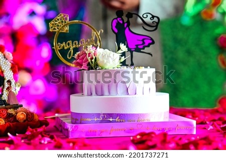 Engagment cake with flowers and Couple Silhouettes. Proposal Invitation. Symbols of Love and couple. Valentine Day.