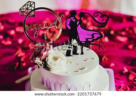 Engagment cake with Couple Silhouettes and Roses. Proposal Invitation. Symbols of Love and couple. Valentine Day.