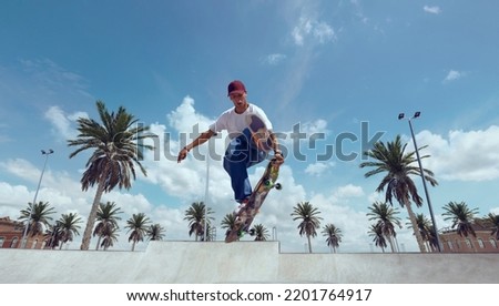 Skateboarder doing a trick in a skate park
