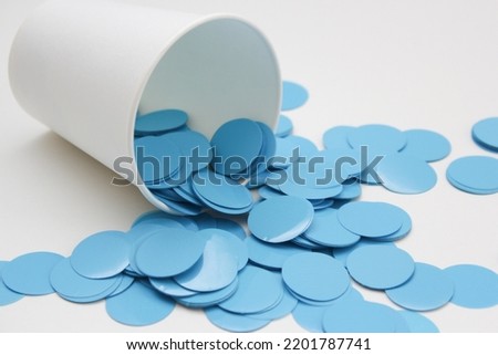 blue confetti circles on white background
