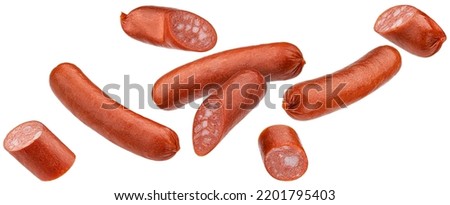 Falling smoked sausages isolated on white background Royalty-Free Stock Photo #2201795403