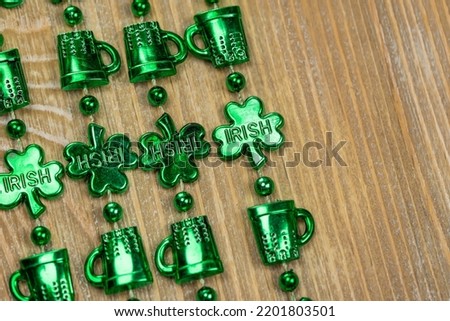 Green shamrocks necklace preparing for St Patrick day  