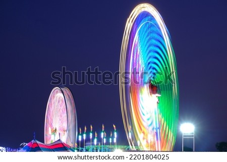 Fun rides at a fair or carnival at night