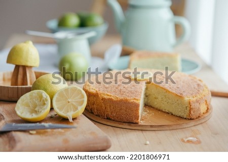 Delicious lemon cake with fresh slices of Lemon, Homemade cake with yellow lemon, a classic recipe, Citrus lemonade. Selective focus.healthy dessert and pastry.