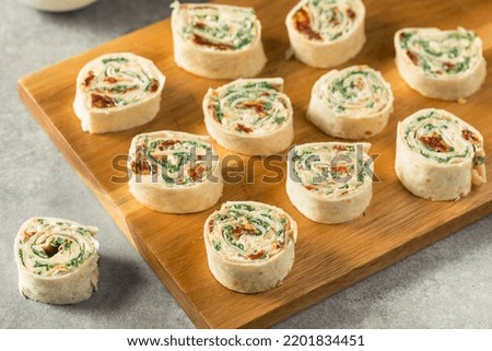 Homemade Pinwheel Tortilla Appetizers with Cream Cheese and Spinach Royalty-Free Stock Photo #2201834451