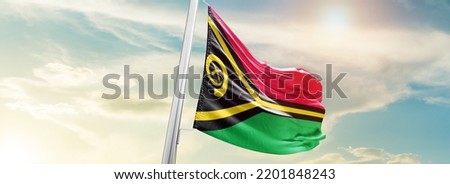 Vanuatu national flag waving in beautiful sky.