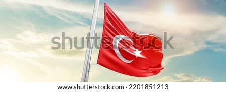 Turkey national flag waving in beautiful sky.