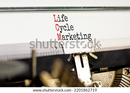 LCM lifecycle marketing symbol. Concept words LCM lifecycle marketing typed on the old retro typewriter on a beautiful white background. Business and LCM lifecycle marketing concept. Copy space.
