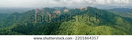 Panoramic aerial drone view of green lush rural area scenery in Sungai Lembing, Pahang, Malaysia