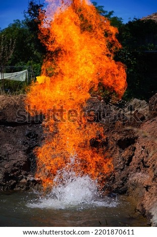 gas bag burning. gas burning from water.