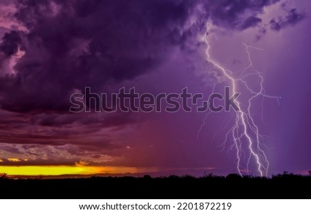 Lightning strike in the night sky. Night sky with lightning strike