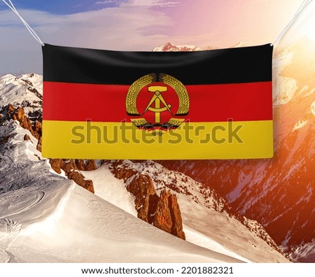 Germany  2 national flag cloth fabric waving on beautiful Background.