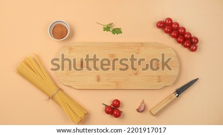 Kitchen background with ingredients for spaghetti cooking recipe, minimal cooking concept, traditional italian cuisine, business card for restaurant, cafe, shop, menu, selective focus, top view