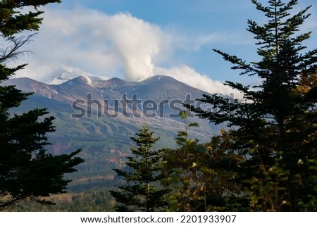 First snow autumn volcano peak
