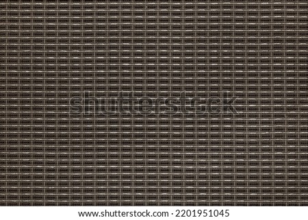 Speaker grill cloth from a vintage speaker. Background or texture. Retro vintage style. Royalty-Free Stock Photo #2201951045
