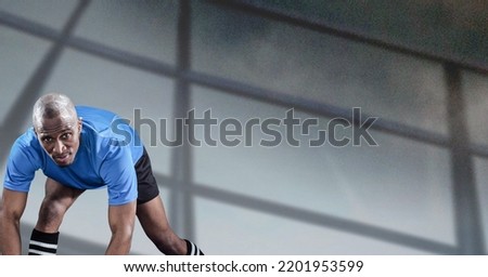Composition of male rugby player over sports stadium. sport and competition concept digitally generated image.