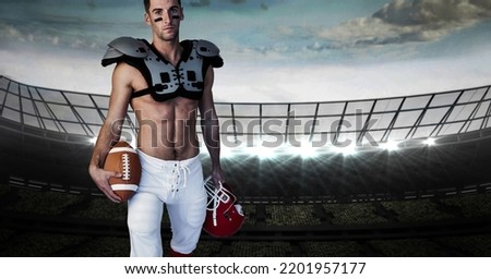 Composition of male american football player holding ball over sports stadium. sport and competition concept digitally generated image.