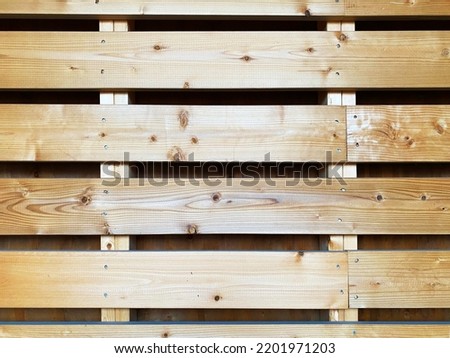 a wooden barn door wall slat wall wood plank board ranch boards shed building material background construction backdrop Royalty-Free Stock Photo #2201971203