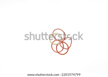 Portrait of red and yellow rubber band