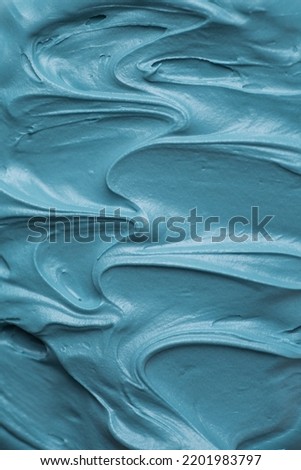 Light blue icing frosting close up texture