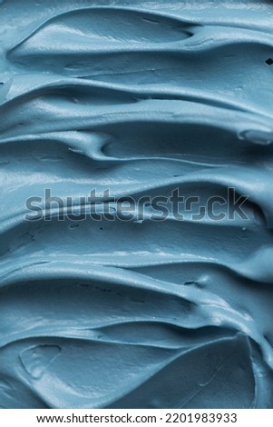 Blue icing frosting close up texture