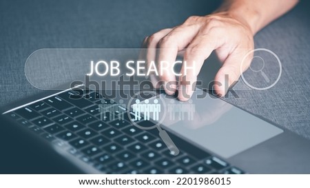 Searching for jobs and employment with online networking technology, recruiting careers and jobs from companies via the Internet, business people find information and new jobs through laptops. Royalty-Free Stock Photo #2201986015