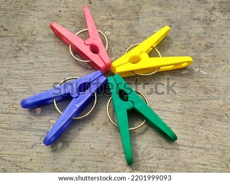 colorful laundry clothespin clips, made of plastic 