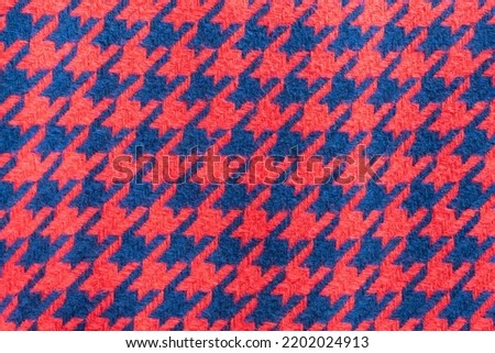 Beautiful Navy blue and red wool houndstooth background. Houndstooth seamless pattern. Houndstooth background.