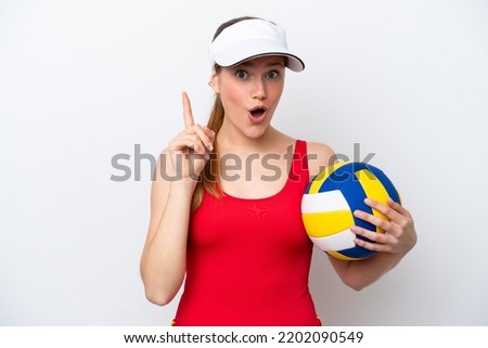 Young caucasian woman playing volleyball isolated on white background intending to realizes the solution while lifting a finger up