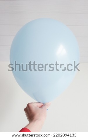 blue latex balloon isolated on white background