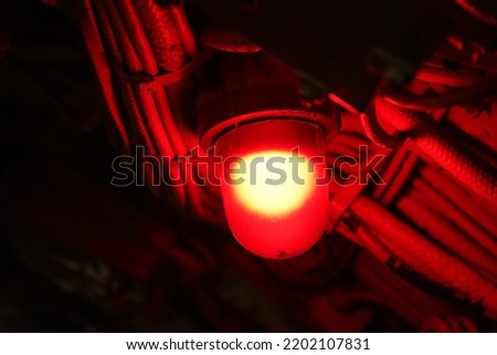 military war submarine warship ship interior red alarm light lamp  Royalty-Free Stock Photo #2202107831