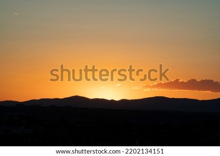 Blurred Twilight sky, Golden hours gradient background. Mountains silhouette and cloud. Copy space Royalty-Free Stock Photo #2202134151