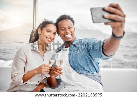Couple, selfie and toast on a yacht with a phone for celebration, anniversary and luxury together. Champagne, happy and sailing with young man and woman, smile for a picture for summer holiday