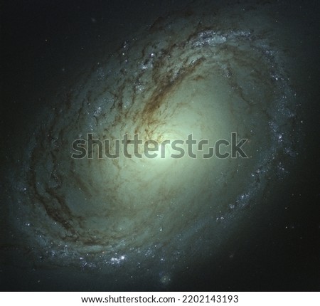 Spiral Galaxy M96, NCG 3368 in green light. Elements of this picture furnished by NASA
