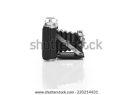 Old camera isolated on pure white background with clipped path