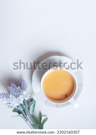 A cup of thai tea with ice. Sweet taste. Isolated background in white. 