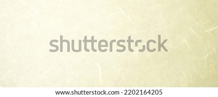 Abstract yellow Japanese paper texture for the background.
Mulberry craft paper korean pattern seamless.  panoramic.