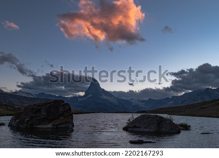Matterhorn peak as seen from Lake Stellisee before sunset, Zermatt, Switzerland