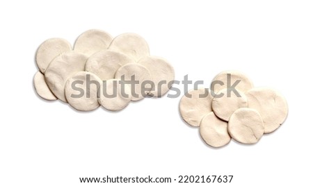 two clouds from plasticine on a white background
