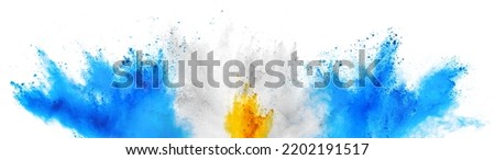 colorful argentinian flag cyan blue yellow color holi paint powder explosion on isolated white background. argentina south america  celebration soccer travel tourism concept Royalty-Free Stock Photo #2202191517
