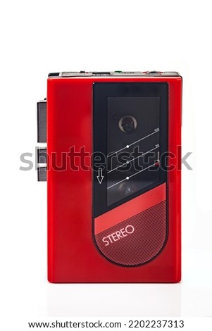 Beautiful red vintage audio cassette player over white background Royalty-Free Stock Photo #2202237313