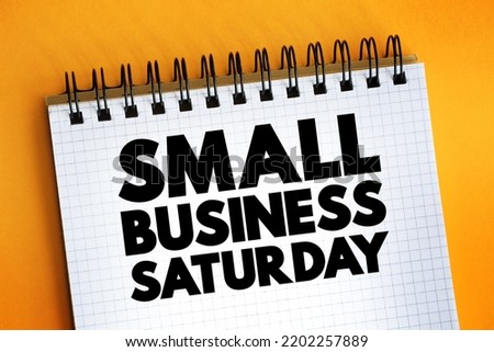 Small Business Saturday - shopping holiday held during the Saturday after Thanksgiving, one of the busiest shopping periods of the year, text concept on notepad Royalty-Free Stock Photo #2202257889