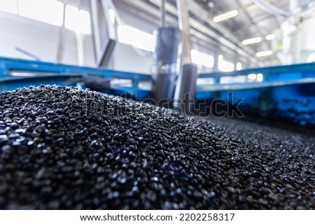 polymer for pipes, plastic close-up, raw material Royalty-Free Stock Photo #2202258317