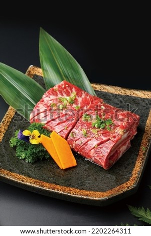 Japanese barbecue, Barbecue grill burning , Japanese buffet restaurant. snowflakes and beef，marbled beef