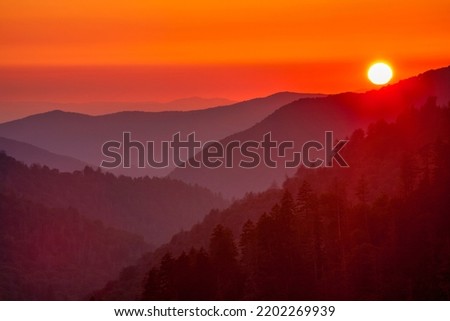 Sun sets over the Morton Overlook in the Great Smoky Mountains National Park Royalty-Free Stock Photo #2202269939