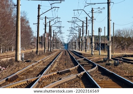 electrified railway on a blue sky background.
