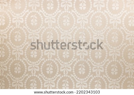 Vintage wall tapestry background texture with repeat floral pattern.
